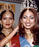 Subrina, being crowned by the outgoing queen Amrita