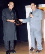 Vijay Chandar, receiving lifetime achievement award for his contributions to Telugu movies