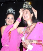 Neha Multani, Nisha Mirchandani, the outgoing queen, crowns the winner Neha Multani.