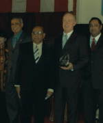 Recognizing Raymond Fredericks, Dharmatma Saran recognizing Raymond Fredericks, President of JFK Hospital and committee members of Dr. G.N. Roy Cancer Fund