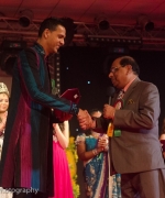 Honoring, Dharmatma Saran honoring Anil Ramhit Doebe of SurIndia Glamour